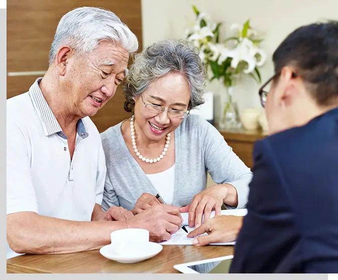 A couple of people sitting at a table